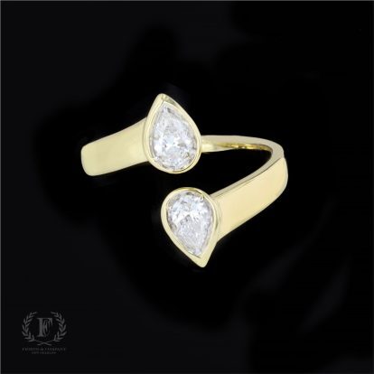 DUAL PEAR CUT DIAMOND BYPASS RING
